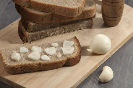 Rye bread with garlic and salt - traditional appetizerの写真素材