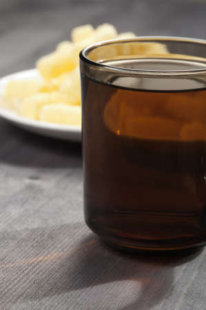 Cup of tea with corn flakes for breakfastの写真素材