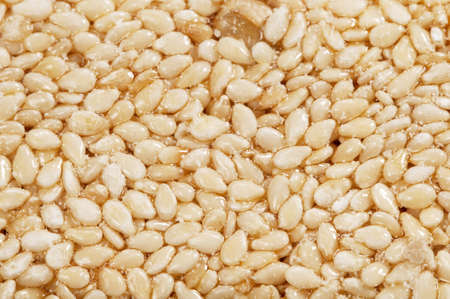 Sesame brittle as a background, macro shot