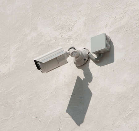 Security Camera on a grey cement wall
