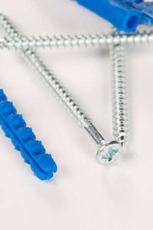 Rawbolts with wall dowels, closeup shot, local focusの写真素材