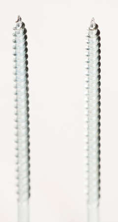 Rawbolts with wall dowels, closeup shot, local focusの写真素材