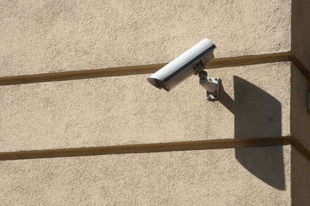 Security Camera on a grey concret wall