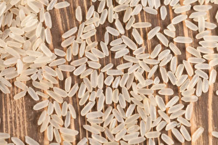 Parboiled rice (raw), closeup shot, local focusの写真素材