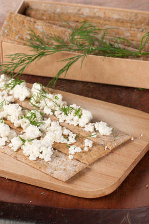 Crisp bread with curd and dill, close upの写真素材