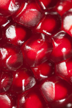 Pomegranate macro shot, local focus on some seeds