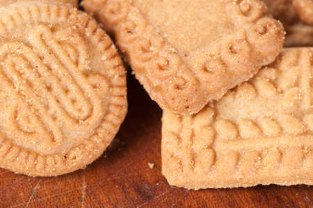 Cookies collection on a timber board, close up