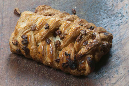 Pecan plait (turnover bun with maple syrup) close up shot