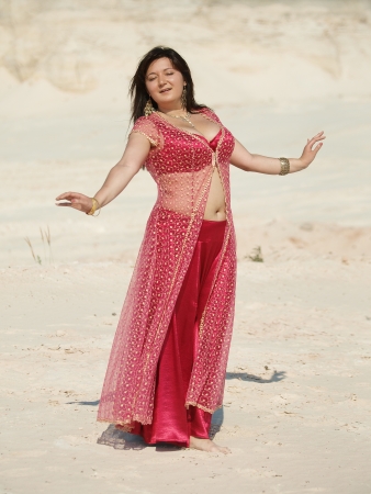 Sensitive dancer in red dressの写真素材