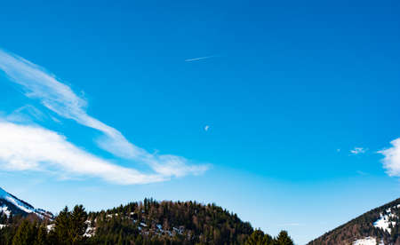 Beautiful top of a grassy hill and sky in Bavaria, Germany