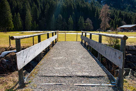 Small wooden bridge in Bavaria, southern Germanyの写真素材