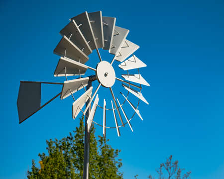 water pumping windmill in Germany on a sunny dayの写真素材