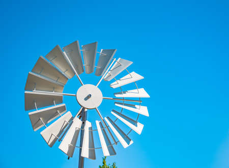 water pumping windmill in Germany on a sunny dayの写真素材