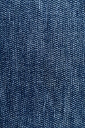 Shabby denim texture. Vertical photography for background
