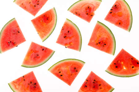 slices of watermelon on a white backgroundの写真素材