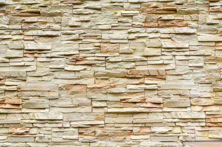 stone wall texture build from sandstone platesの写真素材
