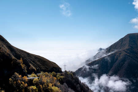 Caucasus, Georgia, Tusheti region, Omalo. Abandoned electric pole facing clouds in the mountains on the road from Alvani to Omala - Tushetiの写真素材