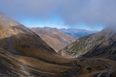 Caucasus, Georgia, Tusheti region, Omalo. Dangerous dirt road on a mountain side going to Tusheti region in Georgiaの写真素材