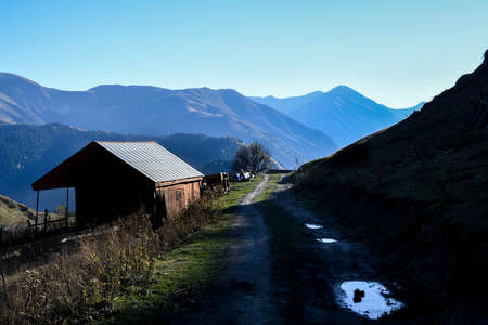 Caucasus, Georgia, Tusheti region, Omalo. A pathway crosses a house in Omala - Tushetiのeditorial素材