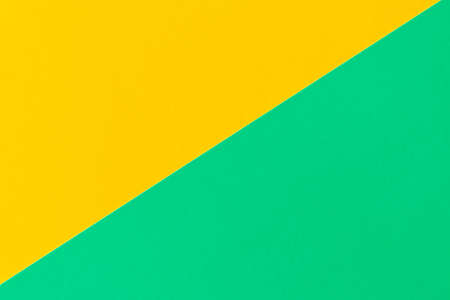 Turquoise-yellow background . Texture of colored cardboard .の写真素材
