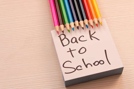 Different colored pencils on the Desk . The concept of school .の写真素材