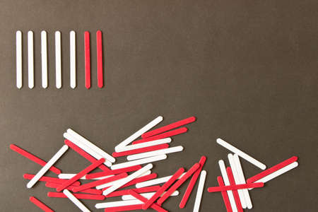 Sticks for the account on the blackboard background.Concept of primary education. Empty text space.の写真素材
