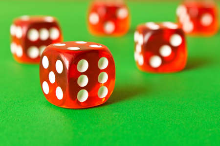Dice on a green background . Game concept. Games of chance.