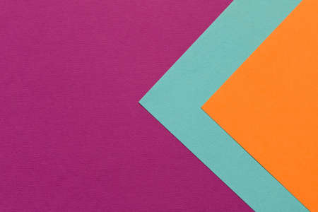 Purple orange blue background texture of colored paper. Trendy colors for design. Abstract geometric background.の写真素材