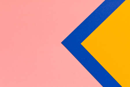 Pink blue yellow background texture colored paper. Trendy colors for design. Abstract geometric background.の写真素材