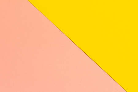 Pink yellow background texture colored paper. Trendy colors for design. Abstract geometric background.の写真素材