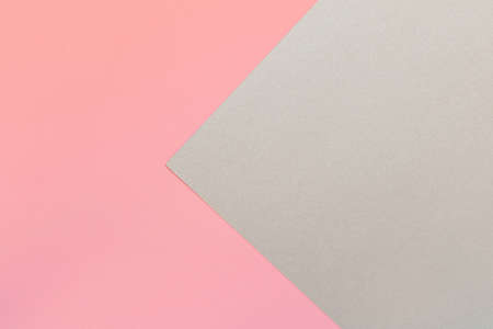 Pink silver colored paper texture background. Trendy colors for design. Abstract geometric background.の写真素材