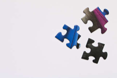 Several pieces of puzzles . Isolated on white background.の写真素材