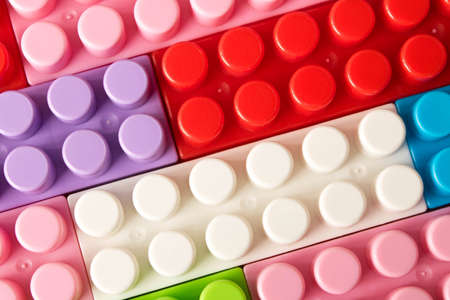 Multi-colored plastic construction set. Children's educational games. Close up.