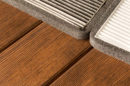 New and old car air filter. Close up