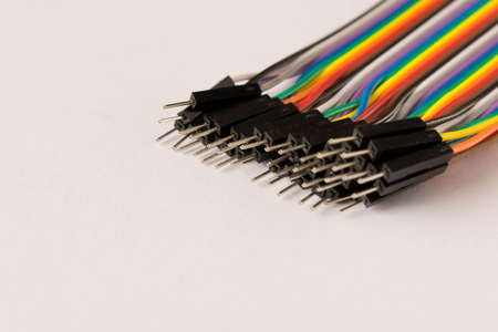 Lots of colorful wires on white background. Abstract background