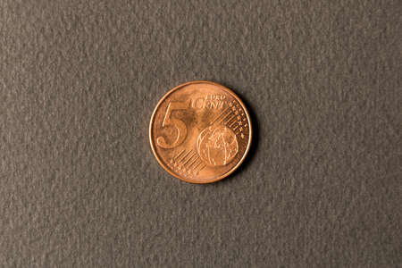 5 euro cents coin on black background. Close up