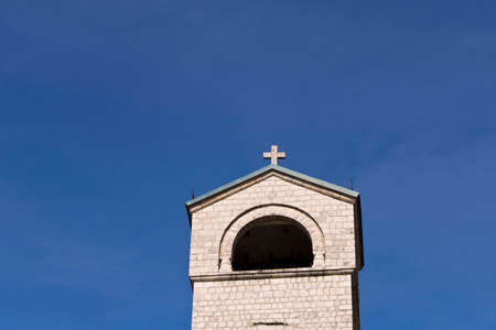 Church in an old monastery against the blue sky in Montenegroの写真素材