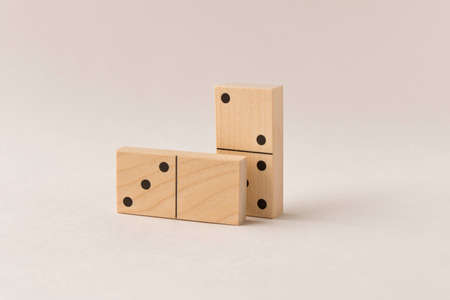 Playing dominoes on a white background. Leisure games concept. Domino effectの写真素材