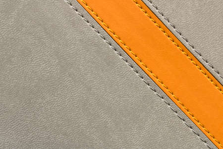Abstract grey background with orange stripe. Conceptual background for the design. Selective focusの写真素材