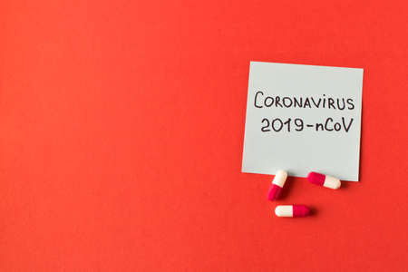 Coronavirus. Sticker with the inscription coronavirus on a red background. The concept of protection from viruses.の写真素材