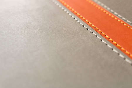 Abstract grey background with orange stripe. Conceptual background for the design. Selective focusの写真素材