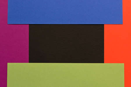 Multi-colored abstract geometric background. Colored sheets of paper on a dark background. Trending colors 2020の写真素材