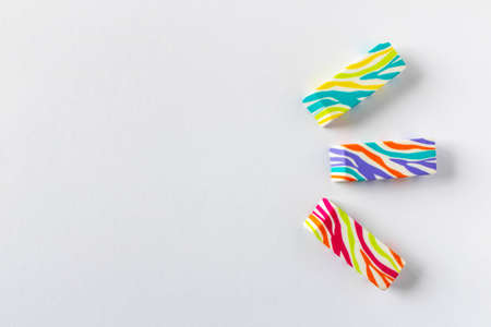 Multi-colored erasers on a light background. Close up. Selective focusの写真素材