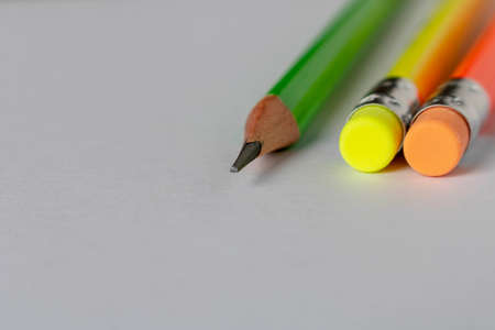 Colorful eraser and simple pencils on a light background. Close up. Selective focusの写真素材