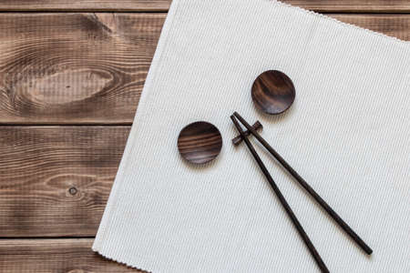 Accessories for sushi on a wooden table. Close up. Selective focusの写真素材