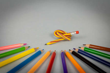 Multicolor pencils and flexible pencil on a light background. Close up. Selective focusの写真素材
