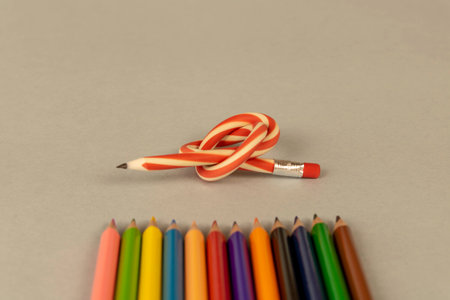Multicolor pencils and flexible pencil on a light background. Close up. Selective focusの写真素材