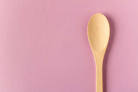 Wooden spoon on a light background. Close-upの写真素材