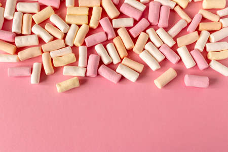 Colorful marshmallows on a pink background. Close-up. Selective focusの写真素材