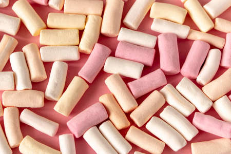 Colorful marshmallows on a pink background. Close-up. Selective focusの写真素材